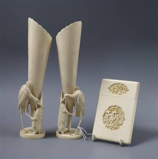 A pair of carved ivory Chinese vases and a carved ivory card case (3)